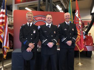 Group photo of promoted firefighters.