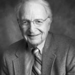 Black and white headshot of Dr. Leonard Cobb
