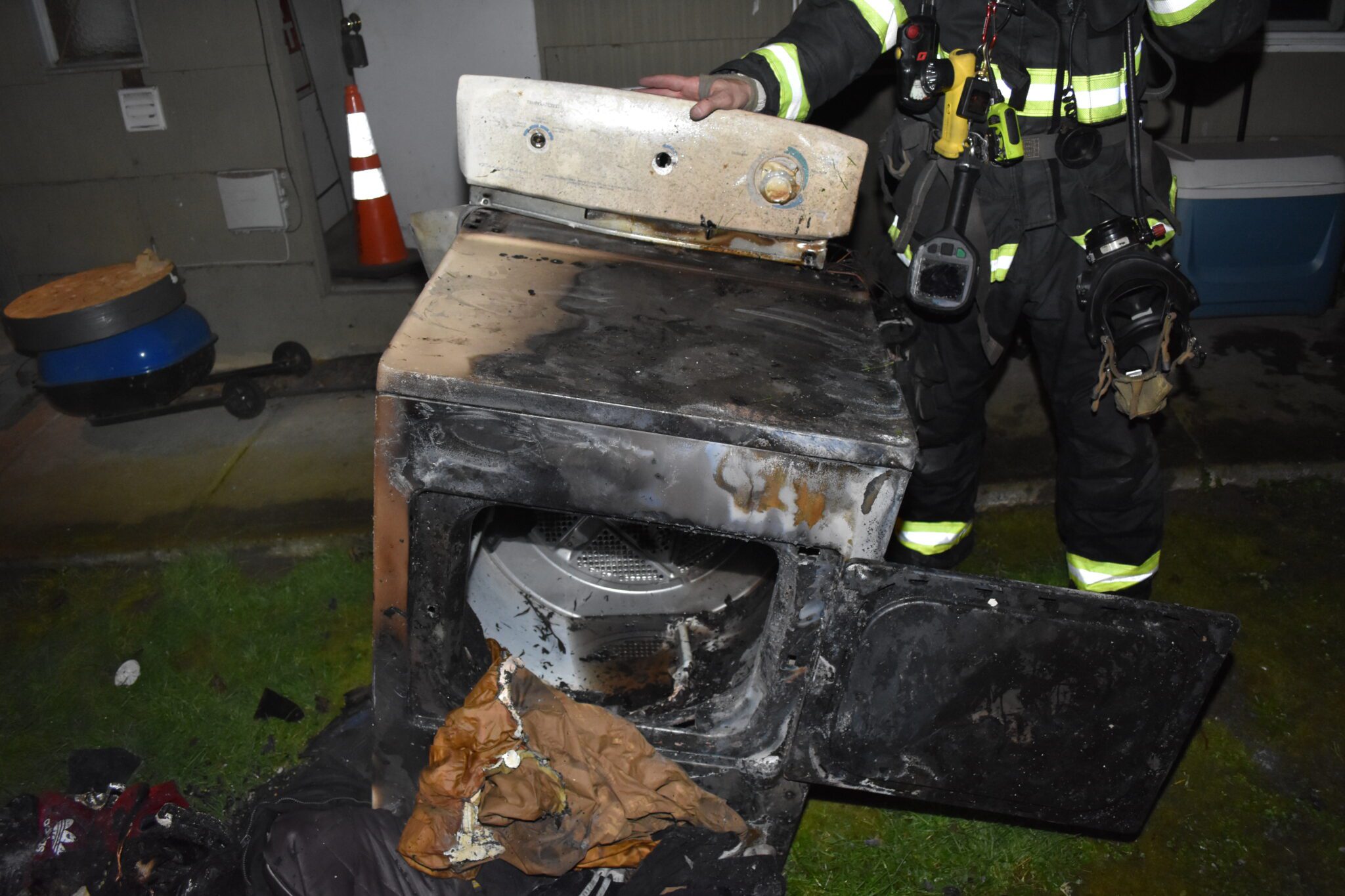 charred clothes dryer from fire