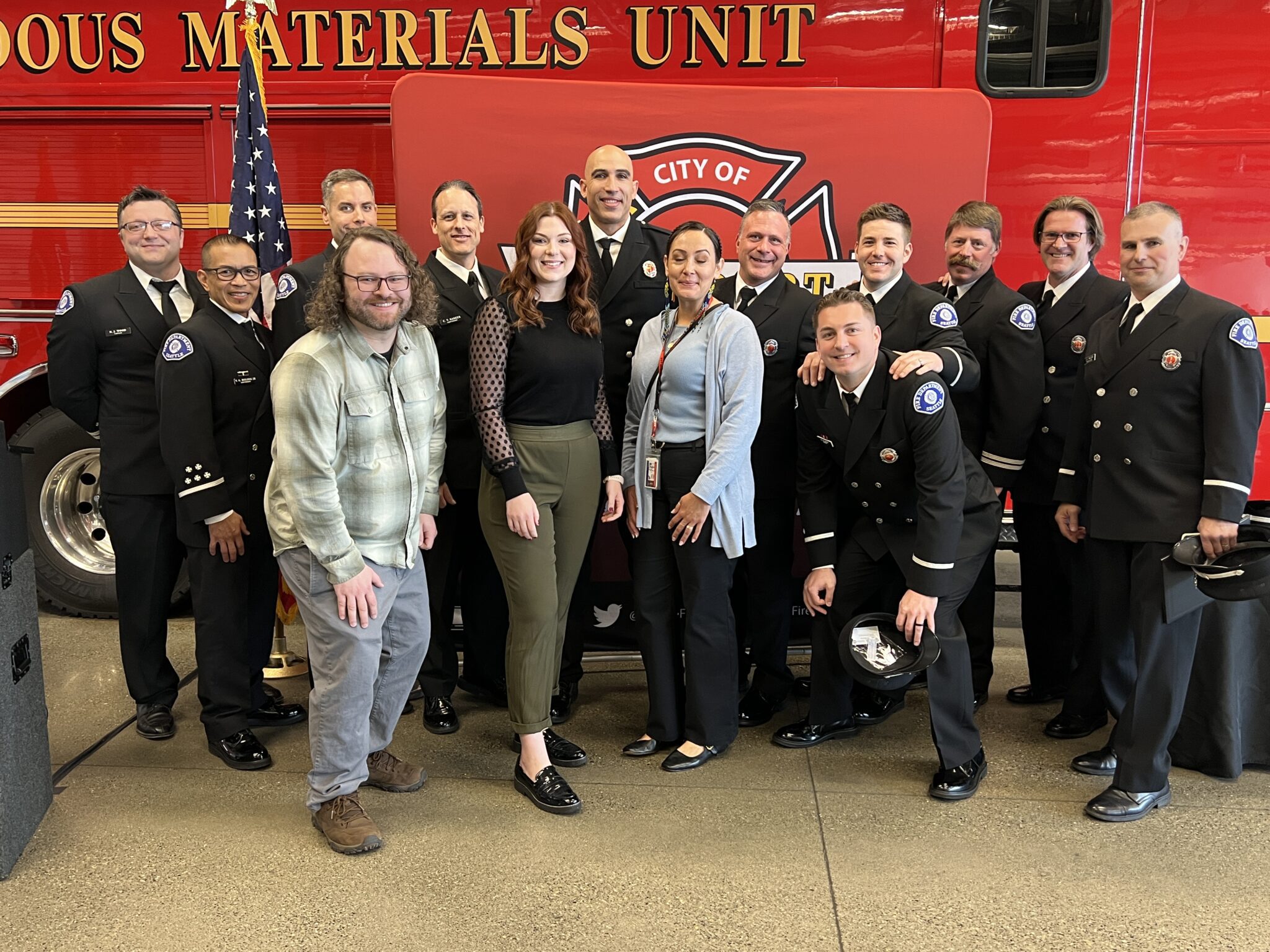 Group photo of the new hires and recently promoted.