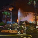 Seattle Firefighters put water on a home on fire in the 4000 block of 43rd Ave. S.