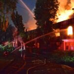 Firefighters put water on a vacant building fire in the 9200 block of Renton Avenue South, in the Rainier Beach neighborhood.