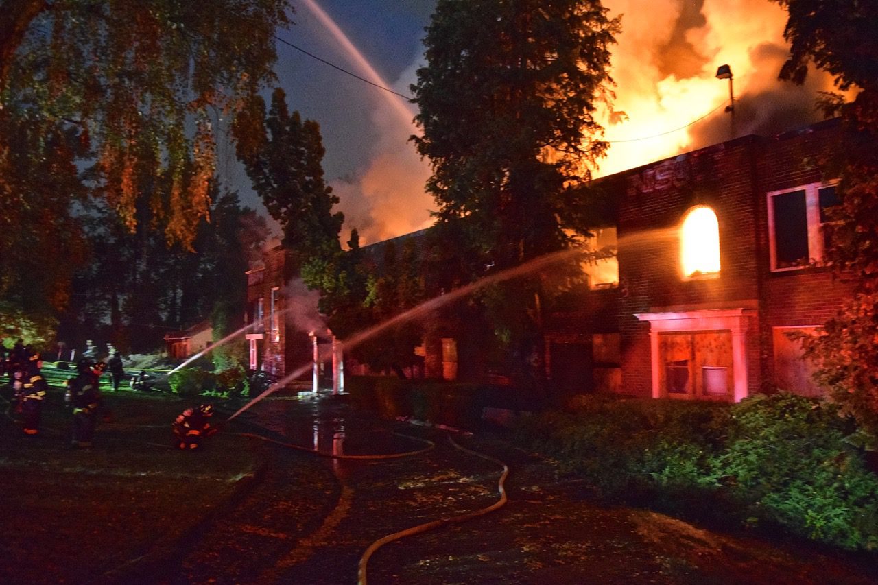 Firefighters put water on a vacant building fire in the 9200 block of Renton Avenue South, in the Rainier Beach neighborhood.